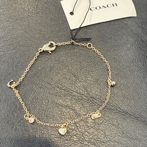 Coach Gold Tone Heart Charm Bracelet